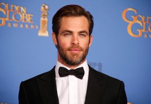 Presenter Chris Pine poses backstage at the 71st annual Golden Globe Awards in Beverly Hills